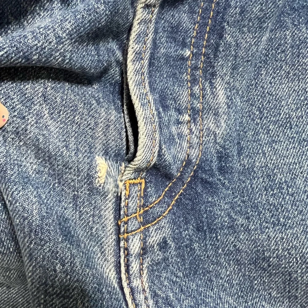 Re Done high rise stove pipe raw frayed hem denim jeans